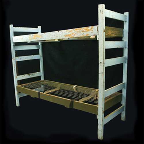 Bunk beds used by the Contreras family, Mexican-American migrant workers, in Wautoma, Wisconsin, 1970s-1980s.